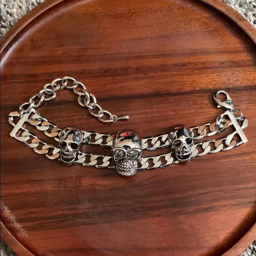 Silver tone rhinestone skull bracelet
